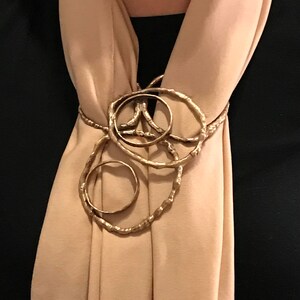 Accesorio de bufanda de bronce