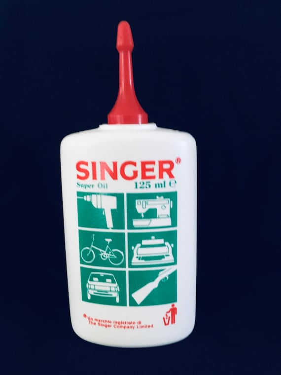 Huile pour machine à coudre Singer. Flacon de 125 ml. Chanteuse