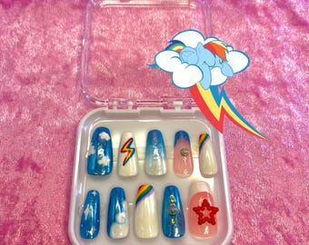 regenboogstreepje op de nagels drukken