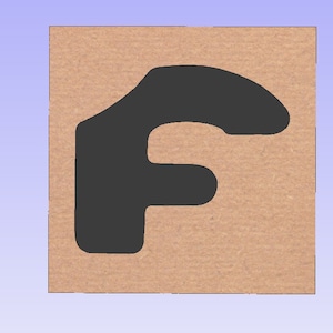 May include: A brown cardboard square with a black cutout of the letter F.