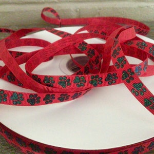 3/8”  Black Glitter Paw Prints on Red Grosgrain Ribbon