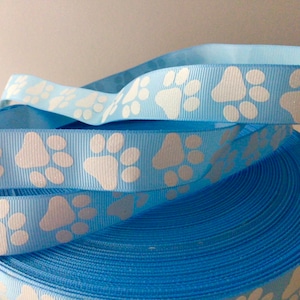 7/8” White Glitter Paw Prints on Light Blue Grosgrain Ribbon