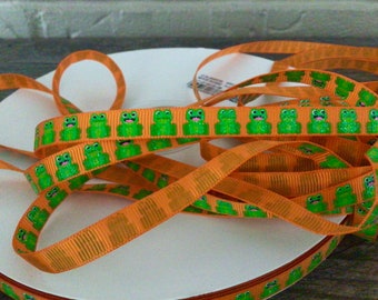 3/8” Frogs on Orange Grosgrain Ribbon
