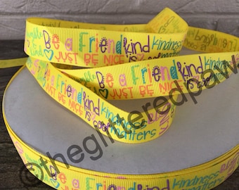 May include: Yellow ribbon with the text "Be a Friend, Kindness is cool, Just Be Nice" repeated in a colorful pattern.