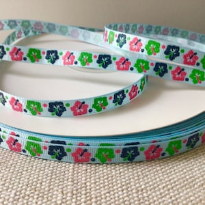 3/8” Hibiscus Flowers on Light Blue Grosgrain Ribbon