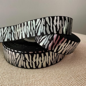 7/8” Silver Foil Zebra Print on Black Grosgrain Ribbon
