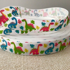 7/8” Long Neck Dinosaurs on White Grosgrain Ribbon