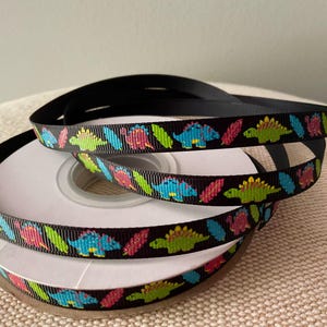 3/8” Dinosaurs on Black Grosgrain Ribbon By The Yard