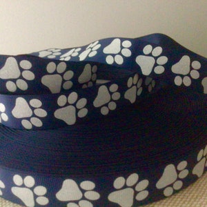7/8” White Glitter Paw Prints on Navy Blue Grosgrain Ribbon