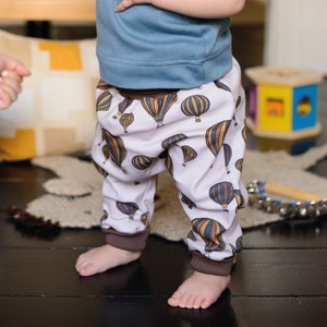 Harem Style Baby, Toddler & Child Trousers Organic Cotton jersey in a Sand Balloons print 'Grow with Me' image 1