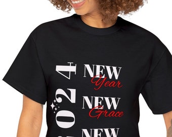 May include: Black t-shirt with white text that reads "2024 New Year New Grace New Praise" with the words "Grace" and "Praise" in red.