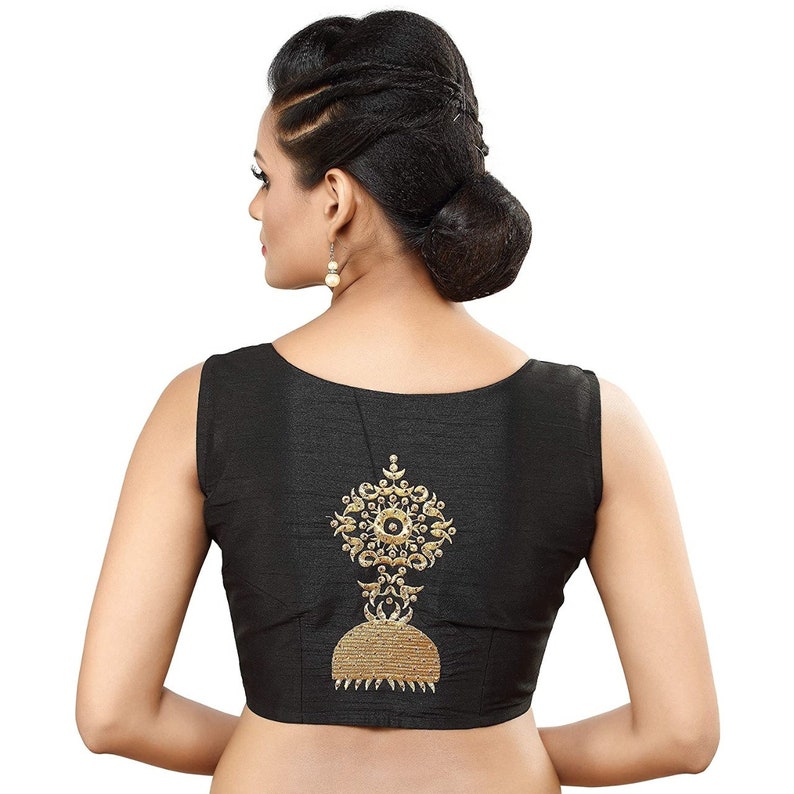 black sleeveless blouse and saree