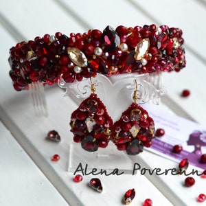 May include: A red and gold beaded headband with matching earrings. The headband is decorated with red and gold beads, as well as clear crystals. The earrings are also decorated with red and gold beads, and have a teardrop shape.
