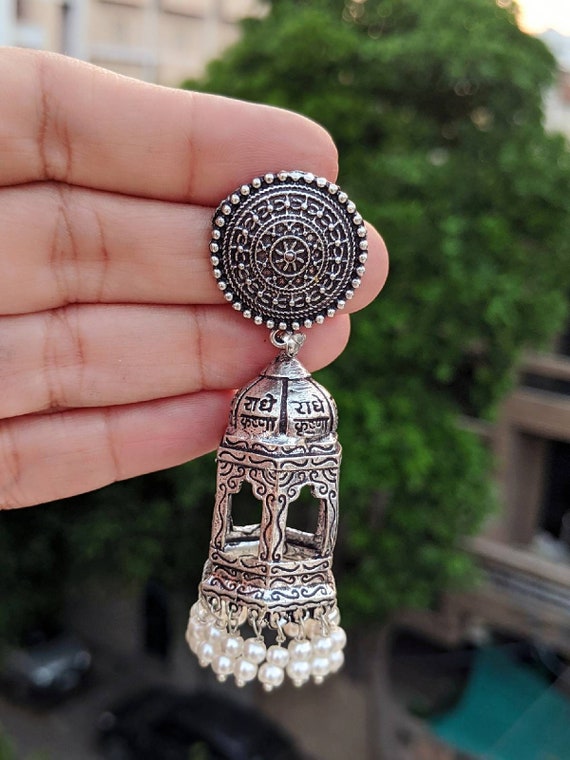 Jogan scripted German silver earring