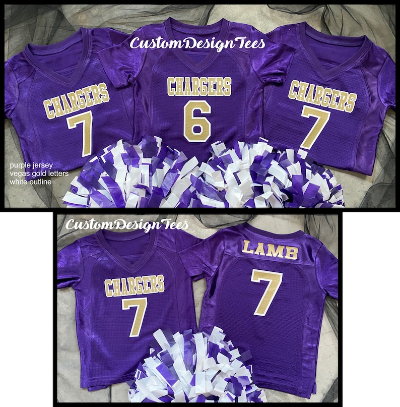 May include: Purple football jerseys with gold lettering and white outlines. The jerseys display the word "CHARGERS" and the numbers 6 and 7. The image also includes white and purple pom-poms. The text "Custom Design Tees" is visible.