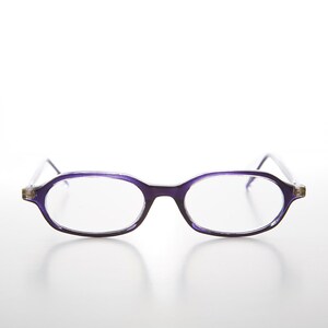 May include: Purple oval-shaped spectacles with clear lenses.