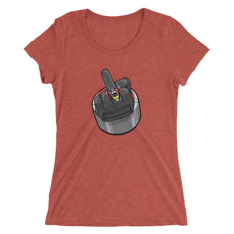 May include: Red, white, and blue graphic tee shirt with a cartoon image of a hand giving the middle finger. The hand is wearing a black glove and a ring with a skull on it.
