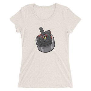 May include: A white women's t-shirt with a cartoon image of a gloved hand giving the middle finger.