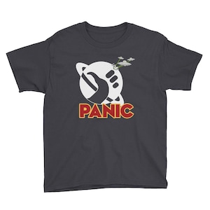 May include: Dark gray youth t-shirt with a white graphic of a hand holding a planet with the word "PANIC" in red and yellow letters.