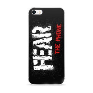 May include: A black iPhone case with a white distressed graphic that says "FEAR THE PHONE" in red letters.