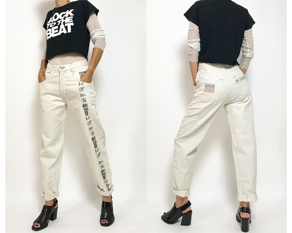 white jeans with patches