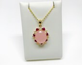 Natural Pink Jade (Jadeite) pendant necklace with natural Ruby, Moonstone and White Topaz in 18K gold plated silver. Carats weight 8.72 Ct