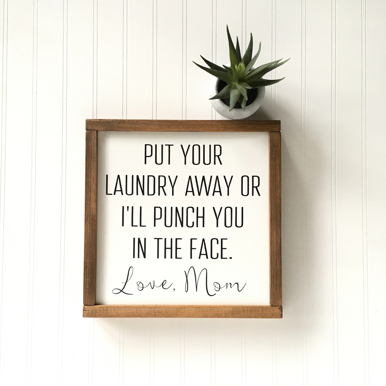 Laundry sign. My funny Laundry. Put your away waltug. Read this and we'll Punch you. Punch away