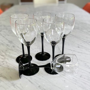 An Alluring and Rare Set of 7 Vintage French Luminarc Octime Tall Wine  Glasses with Oil Black Skinny Stems and Limited Edition Bevel Cut…
