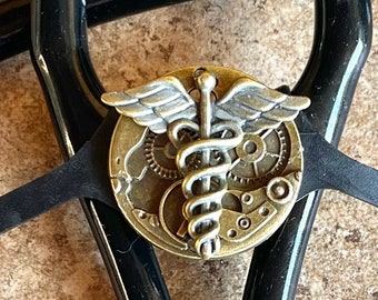 Portatarjetas retráctil Steampunk Caduceo, etiqueta de identificación médica