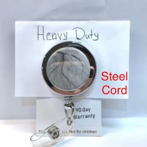 Heavy duty reel Stenosis cardiac cath retractable badge reel ER golden hour arteriogram image stent main blockage CT fluoroscopy