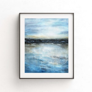 May include: A framed abstract painting of a seascape with a blue and gray color scheme. The painting depicts a horizon line with a dark blue band representing the land and a lighter blue area representing the water. The water is depicted with a series of horizontal brushstrokes, creating a sense of movement and depth.