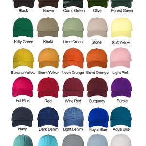 May include: A chart of 25 different colored baseball caps. The caps are arranged in five rows of five caps each. The colors include black, brown, camo green, olive, forest green, kelly green, khaki, lime green, stone, soft yellow, banana yellow, burnt yellow, neon orange, burnt orange, light pink, hot pink, red, wine red, burgundy, purple, navy, dark denim, light denim, royal blue, aqua blue, dark mint, cyan blue, gray, sky blue, and white.