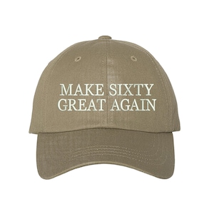 May include: A khaki baseball cap with the text "MAKE SIXTY GREAT AGAIN" embroidered in white.