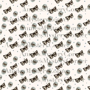 Op de afbeelding: Een herhalend patroon met aquarel illustraties van bruine vlinders en lichtblauwe eieren met vlinderontwerpen. Kleine blauwe stippen zijn verspreid over de gebroken witte achtergrond. De tekst "Annies Mystery Corner" is zichtbaar.