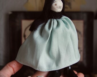 Alice in wonderland and the white rabbit doll