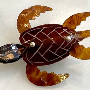 Folk Art Pin Hand-Crafted Carved Polished Shell Articulating Head 1 1/2”