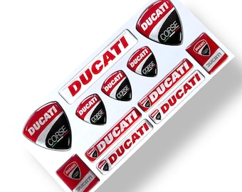 Juego de pegatinas con emblema grande de Ducati Corse en resina epoxi 3D y forma abovedada, en aluminio pulido.