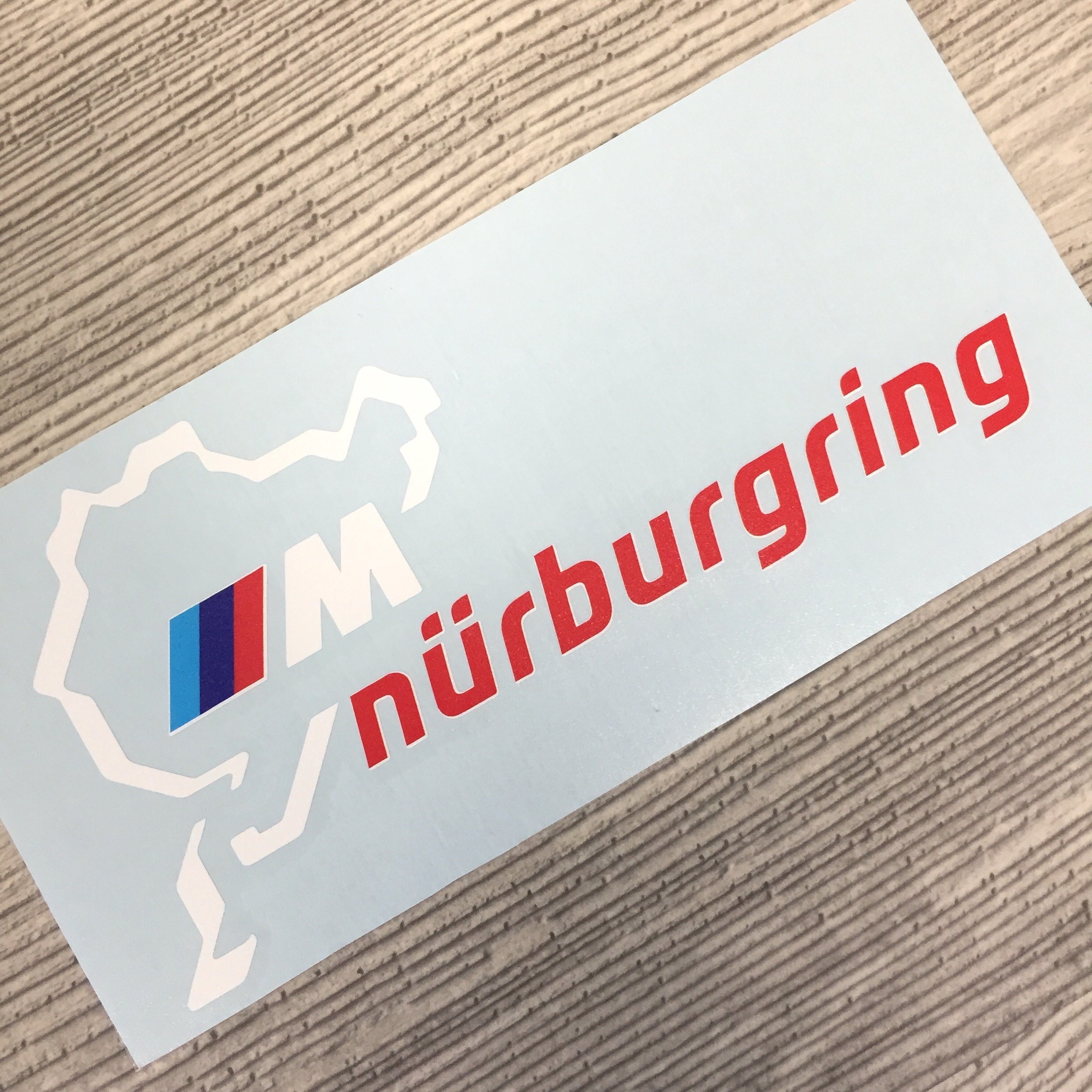 Autocollant Vinyle Nürburgring - Motif Course Automobile - 15 X 10 Cm - Bleu - Pour Vitre, Pare-chocs, Carrosserie