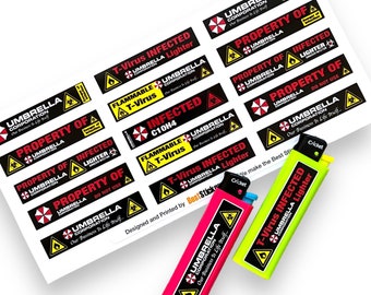 May include: A sheet of stickers featuring the Umbrella Corporation logo and various warnings, including "T-Virus Infected", "Flammable T-Virus", and "Property of Umbrella Corporation". Two lighters are also shown, one red and one green, with the Umbrella Corporation logo and "T-Virus Infected" printed on them.