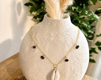 Collar de cauris de zorzal