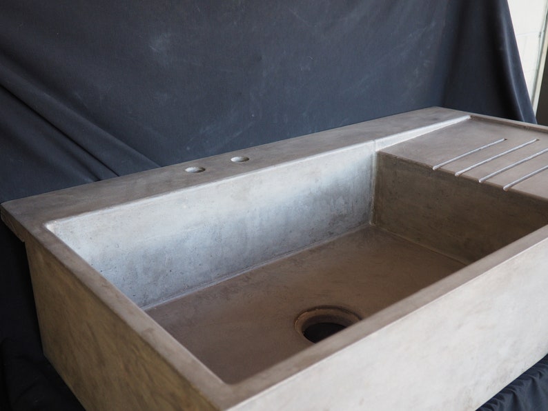 Farmhouse Sink With Faucet Extension And Attached Drainboard