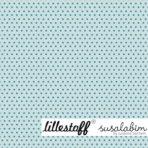 May include: A light blue fabric with a repeating pattern of small teal stars. The fabric has the text "lillestoff® susalabim by susanne bochem" at the bottom.