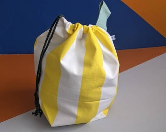 Yellow and White Striped Drawstring Bag