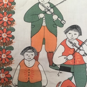 May include: A vintage fabric with a repeating pattern of people playing music. The people are drawn in a simple style with orange, green, and black clothing. The background is white with a border of orange flowers.