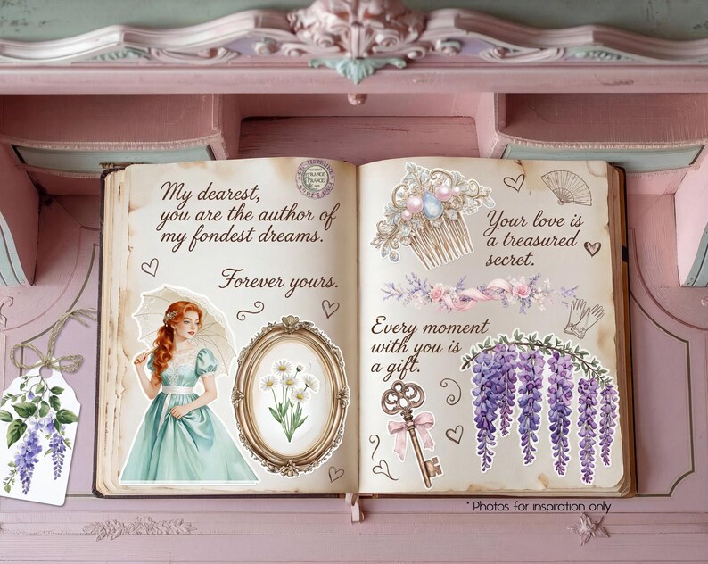 May include: An open book with decorative stickers and handwritten text. The stickers include a woman in a blue dress, floral arrangements, and a key. Text includes "My dearest, you are the author of my fondest dreams" and "Your love is a treasured secret."