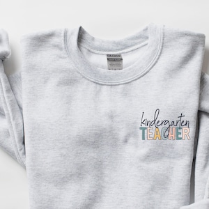 Kindergarten Teacher Sweatshirt | Kinder Team Teach Shirt | Cute School Year Sweater Gifts | Thank you Crewneck | Elementary Kids Pocket