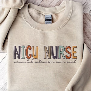 NICU Nurse Sweatshirt | Baby Nursery World's Future Neonatal Crewneck Shirt | New Grad LPN Nursing Graphic Tee, Gift for Nurses Week Sweater