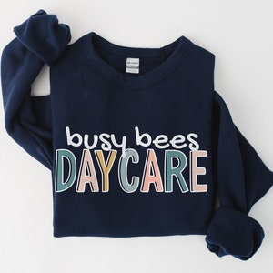 Custom Daycare Sweatshirt | Personalized In Home Day Care Logo Shirt | Childcare Name Gift Tee | Babysitter Nanny Christmas Gifts Crewneck