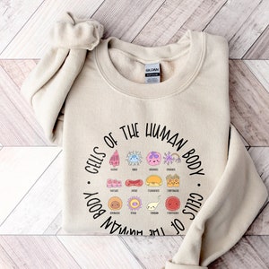 Human Body Cell Sweatshirt | Cells of the Human Body Science Teacher Shirt | Cute Nurse Graphic Crewneck | Human Anatomy Doctor Biology