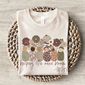 Helping Little Ones Bloom OBGYN Nurse Shirt | Wildflower Obstetrics Gynecology RN Tshirt | Boho Nursing Babies Swaddle Tee | Gift New Nurse
